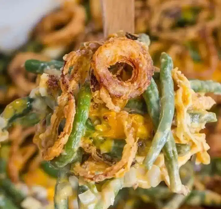 Delicious best green bean casserole topped with crispy onions