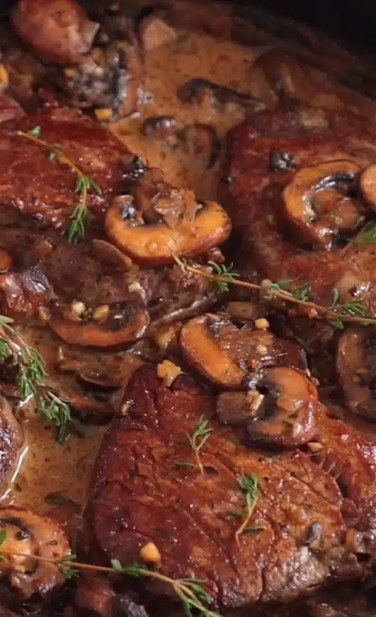 Delicious Filet Mignon in creamy sauce served on a plate