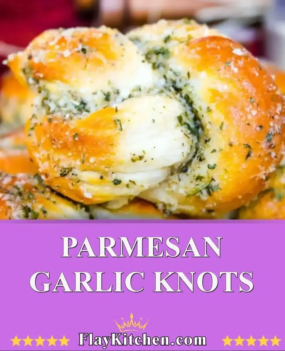 Freshly baked Parmesan Garlic Knots topped with garlic and parsley.