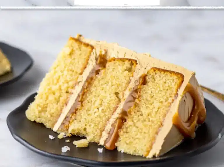 Delicious Salted Caramel Cake with rich frosting and sea salt sprinkles