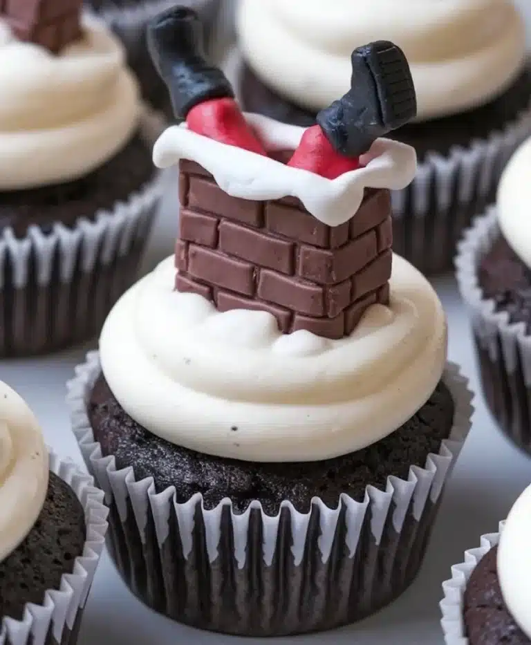 Santa Stuck in the Chimney Cupcakes decorated for Christmas festivities