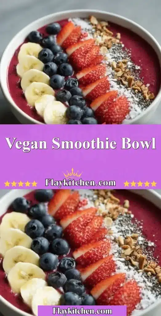 Colorful vegan smoothie bowl topped with fresh fruits and seeds