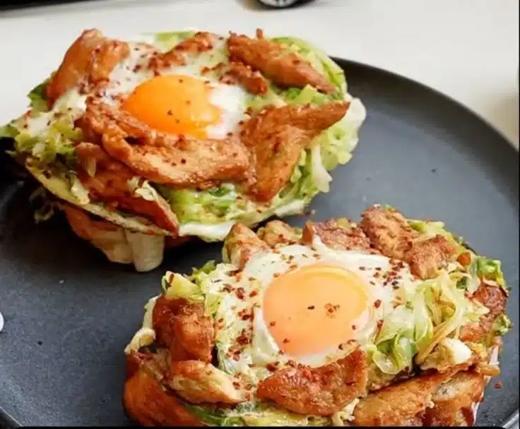 Cabbage chicken sandwich with chicken breast on a plate