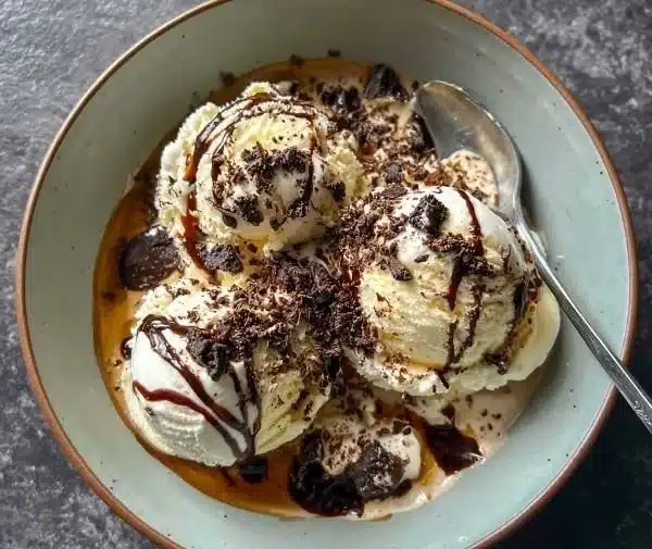 Dirty Snowman Baileys ice cream cocktail with whipped cream and chocolate drizzle
