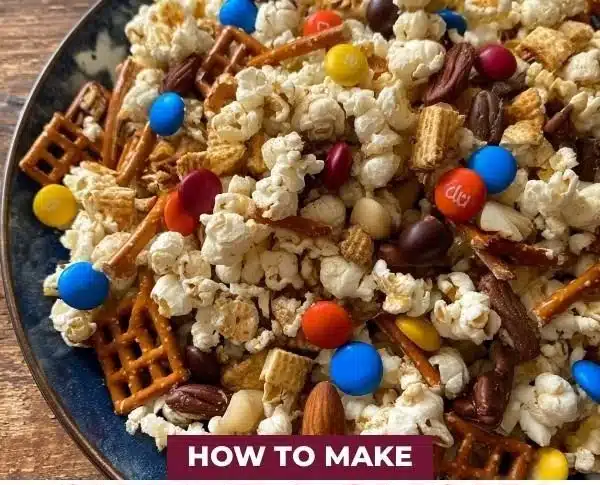 Sweet and smoky party mix snack bowl with varied ingredients.