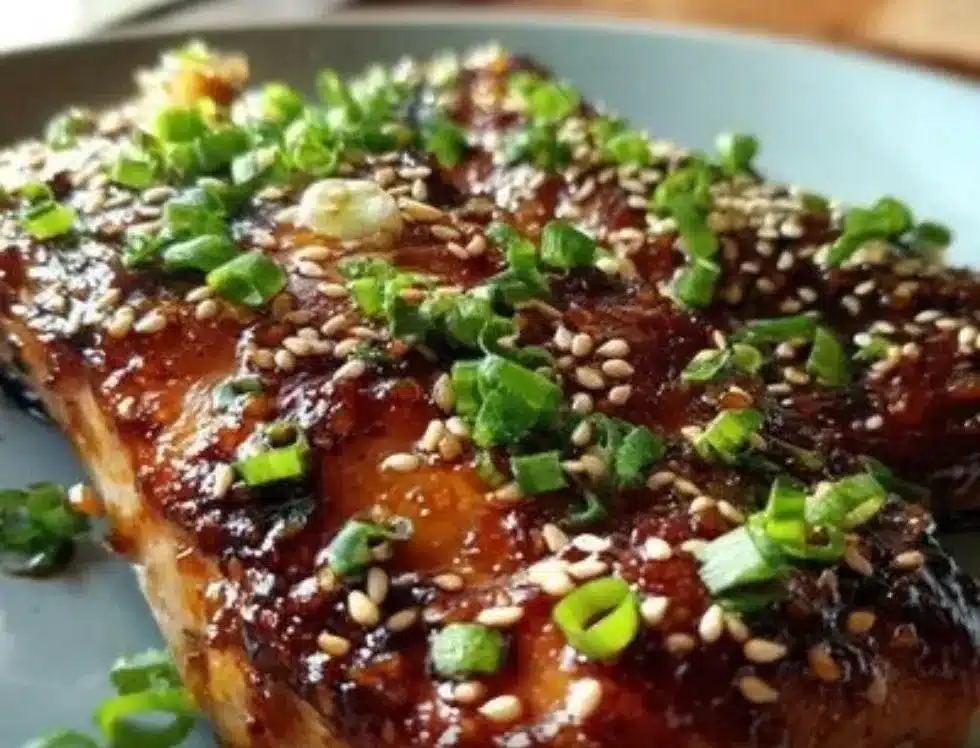 30-minute brown sugar soy sauce salmon dish with vibrant glaze and garnishes