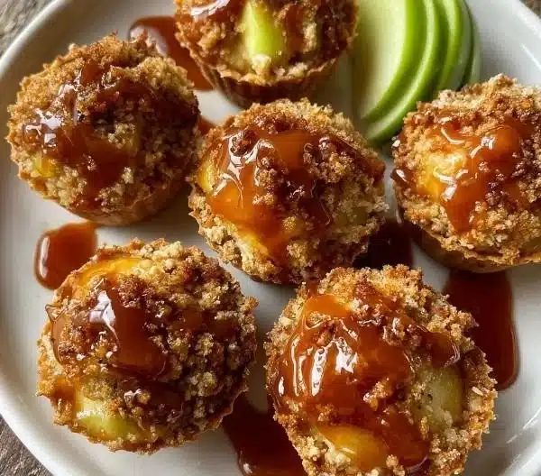 Delicious Caramel Apple Crisp Bites served in a bowl, ideal for dessert lovers.