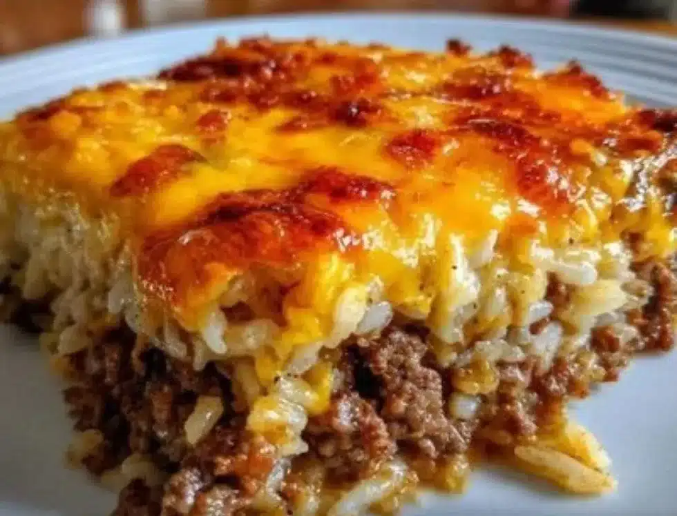 Cheesy Ground Beef and Rice Casserole served in a baking dish.