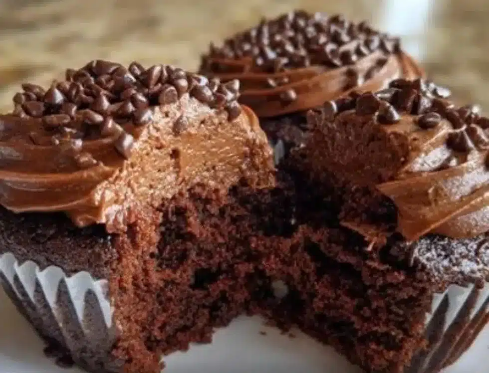 Delicious chocolate cupcakes for two served on a wooden table