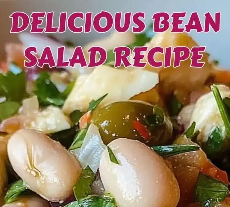 Bowl of easy Mediterranean Bean Salad with olives and onions.