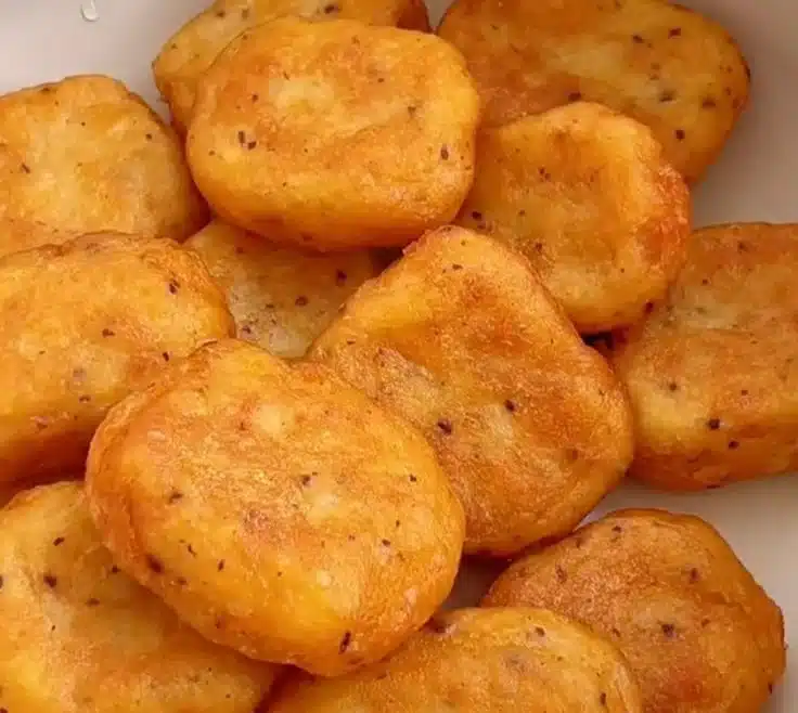 Homemade crispy chicken nuggets served with dipping sauce