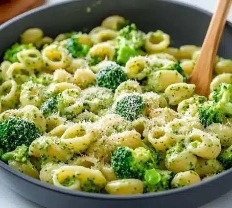 A bowl of light and healthy broccoli pasta with vibrant green broccoli florets