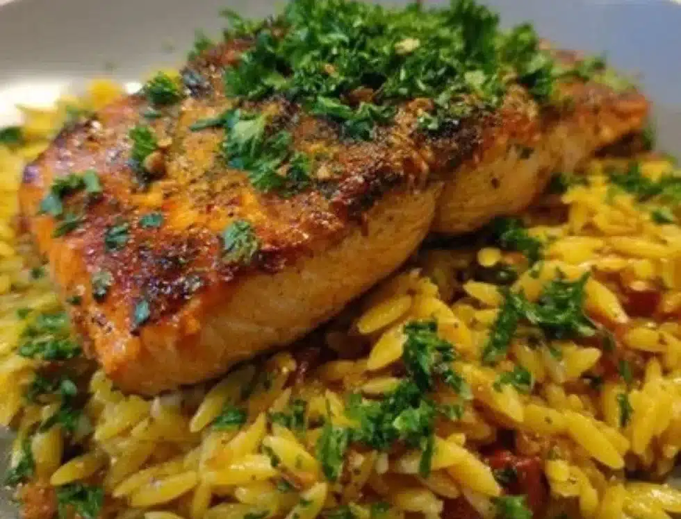 One Skillet Salmon served with Lemon Orzo in a pan