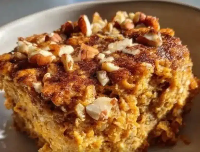 Homemade pumpkin baked oatmeal topped with nuts and spices