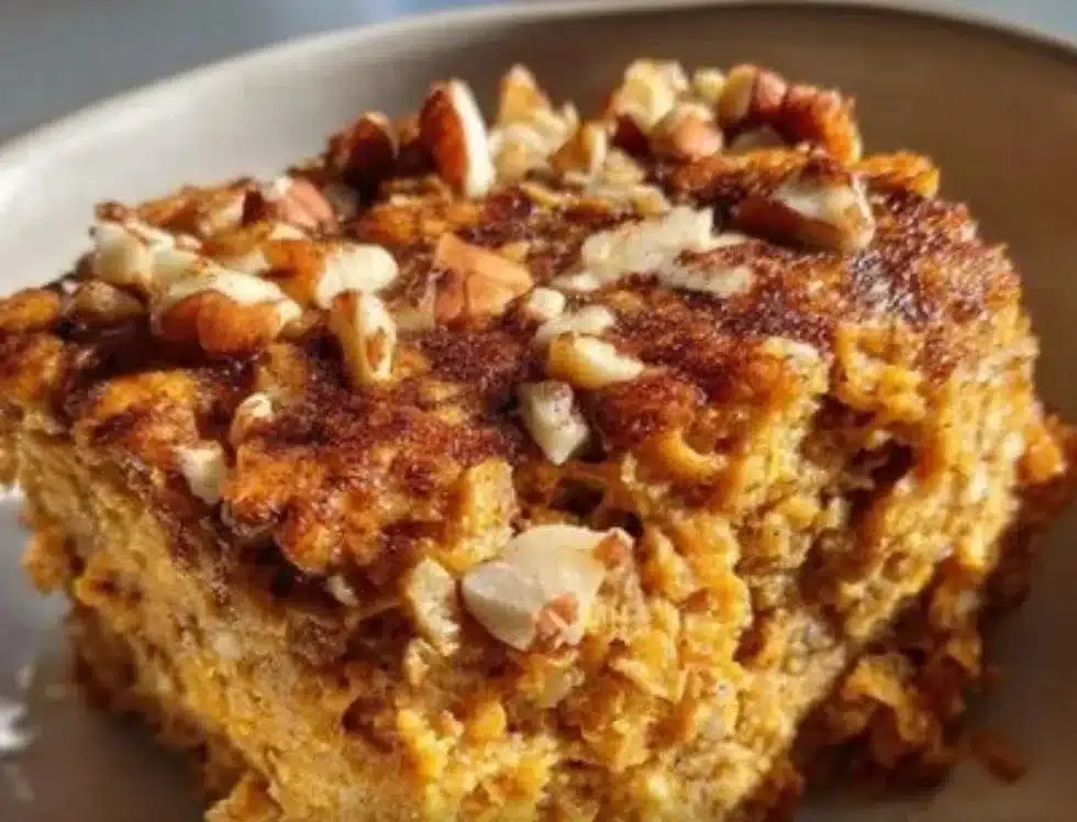 Homemade pumpkin baked oatmeal topped with nuts and spices